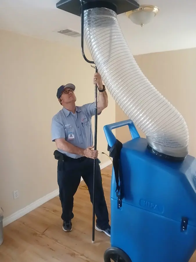 Mini Split Installation technician using HEPA equipment in Ocean Springs